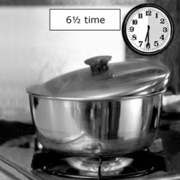 4. Boil slowly for 6½ hours with pot slightly vented so steam can escape.